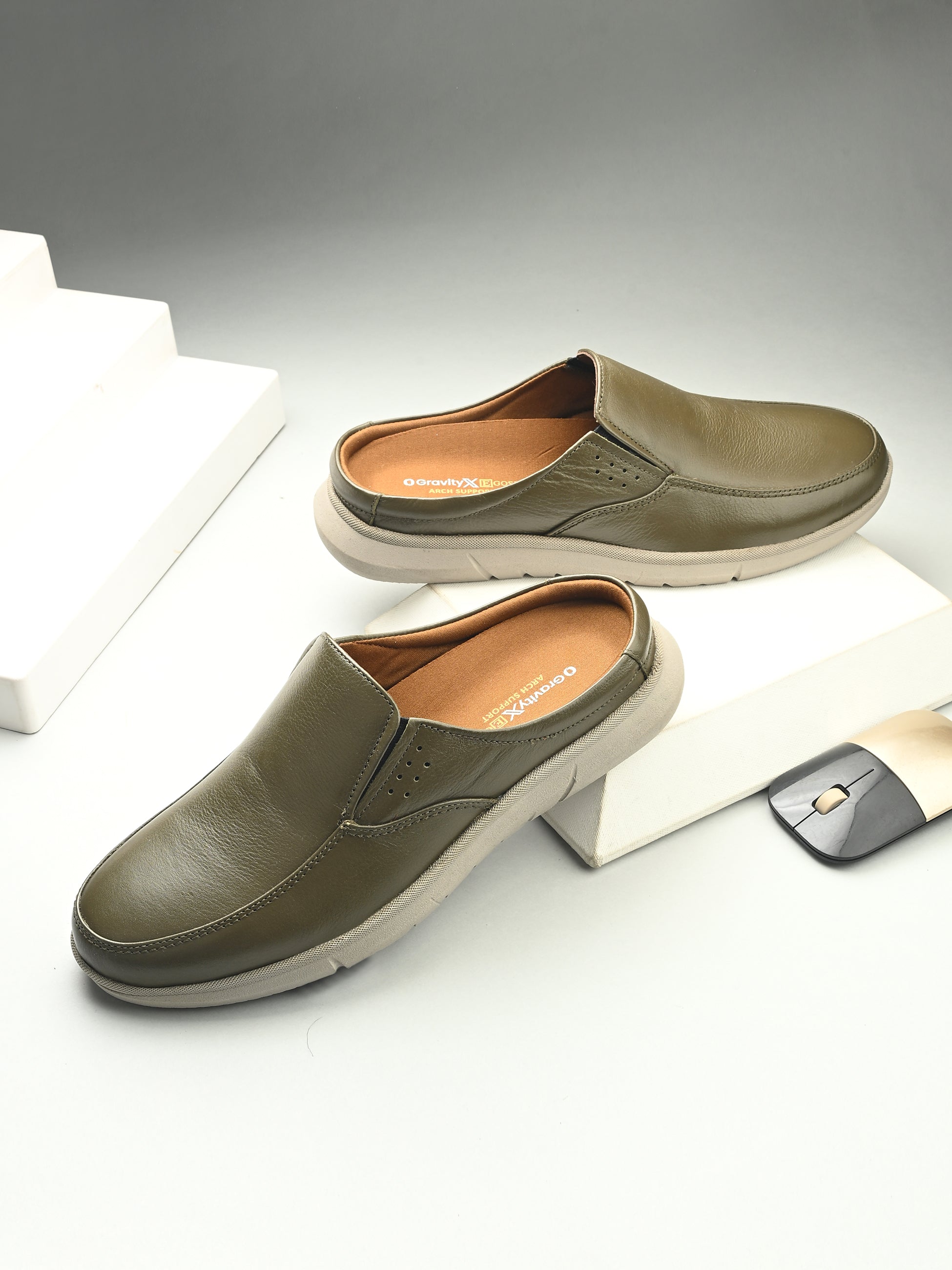 Zero Gravity Slip-On Mules by Egoss