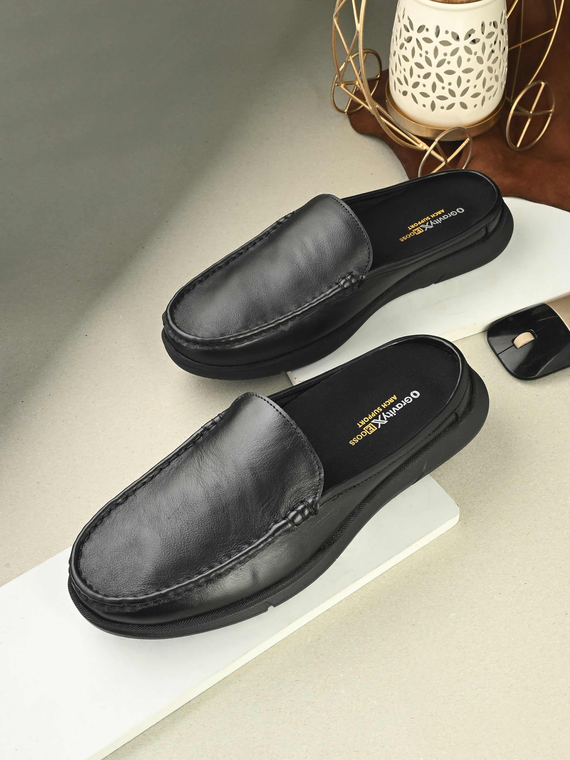 Zero Gravity Slip-On Mules by Egoss