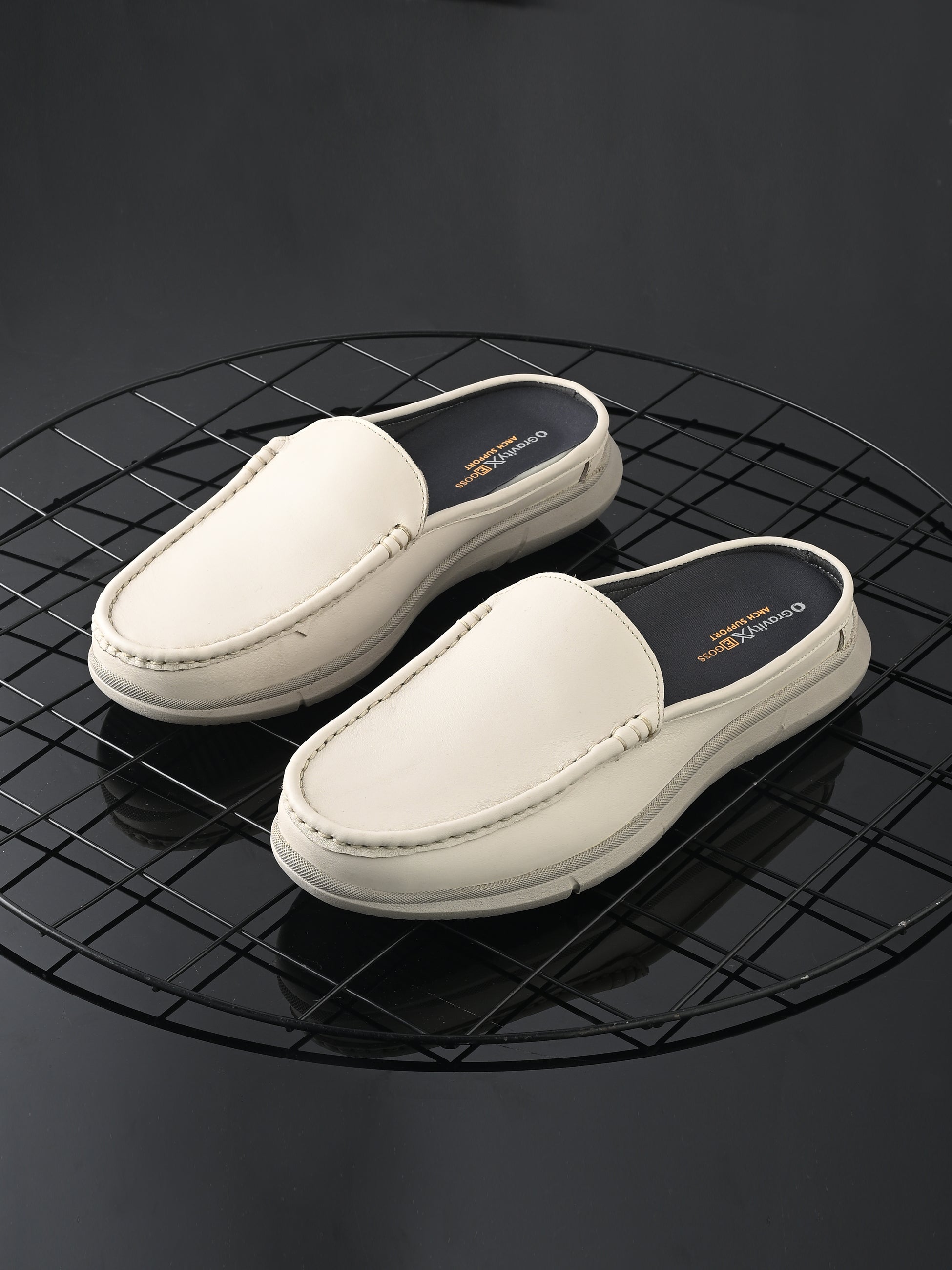 Zero Gravity Slip-On Mules by Egoss