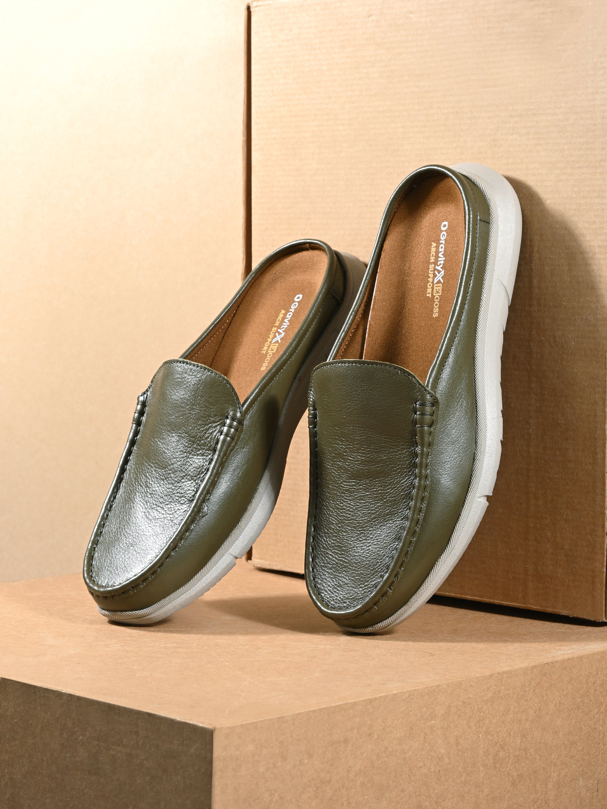 Zero Gravity Slip-On Mules by Egoss