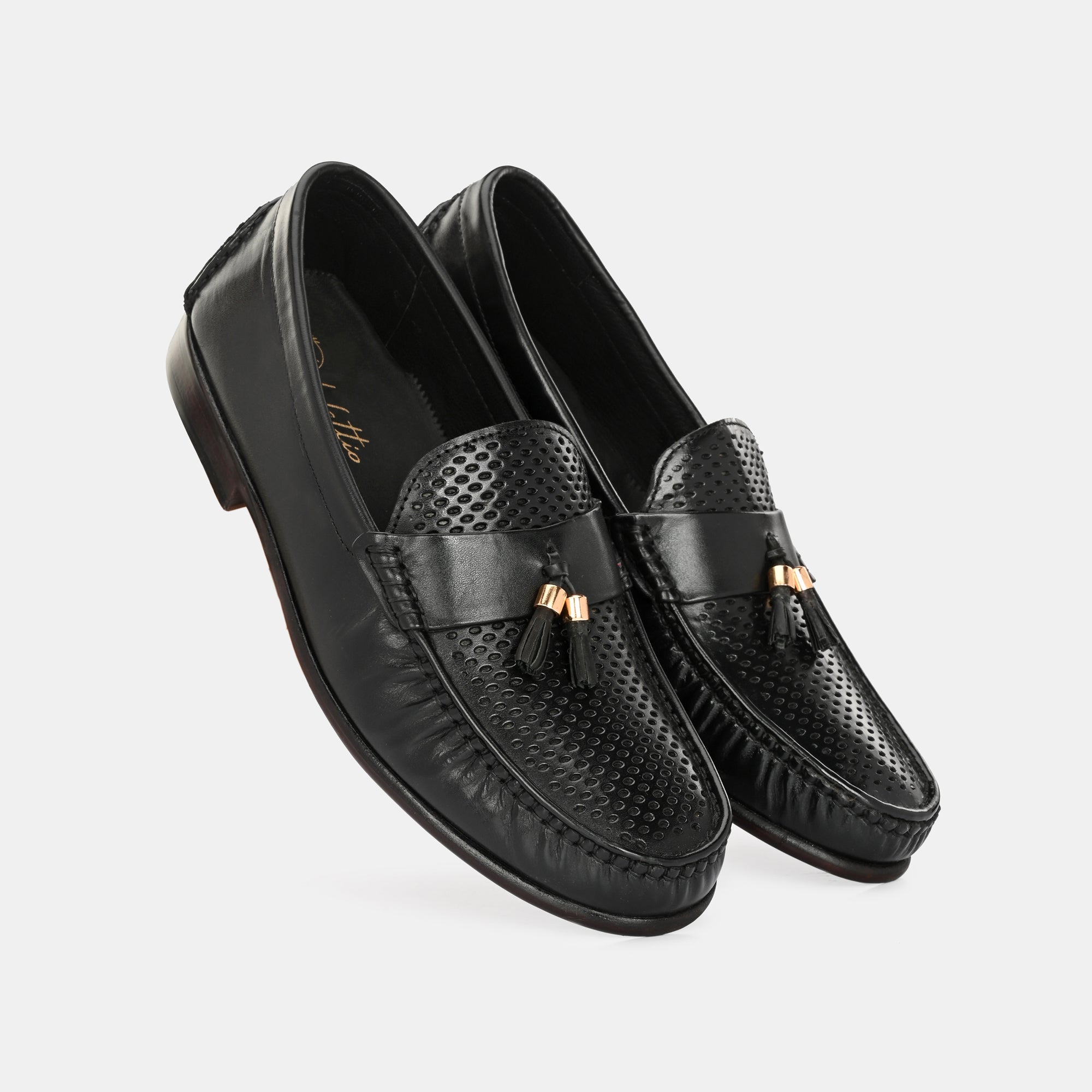 Tan Perforated Tassel Loafers by Lafattio
