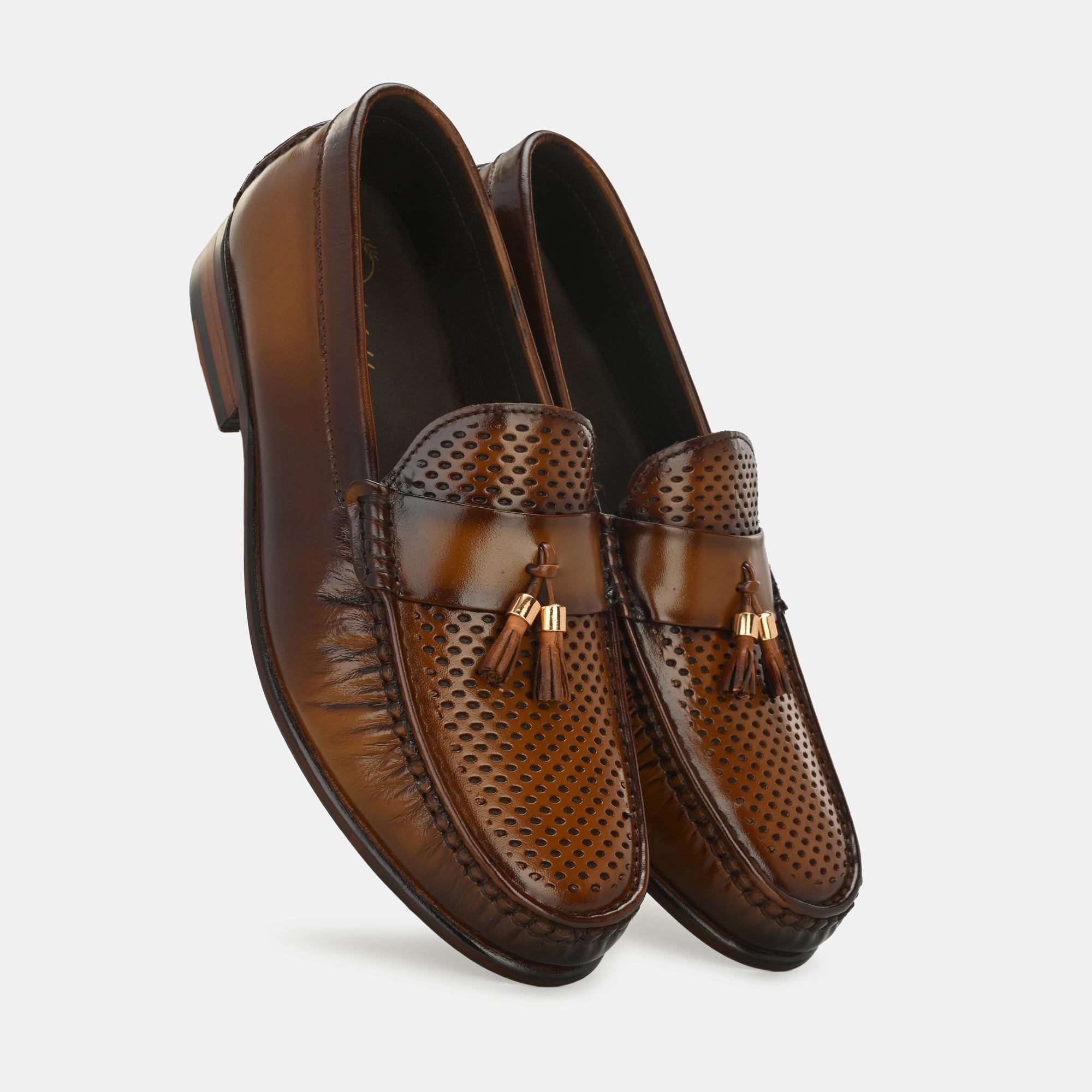 Tan Perforated Tassel Loafers by Lafattio