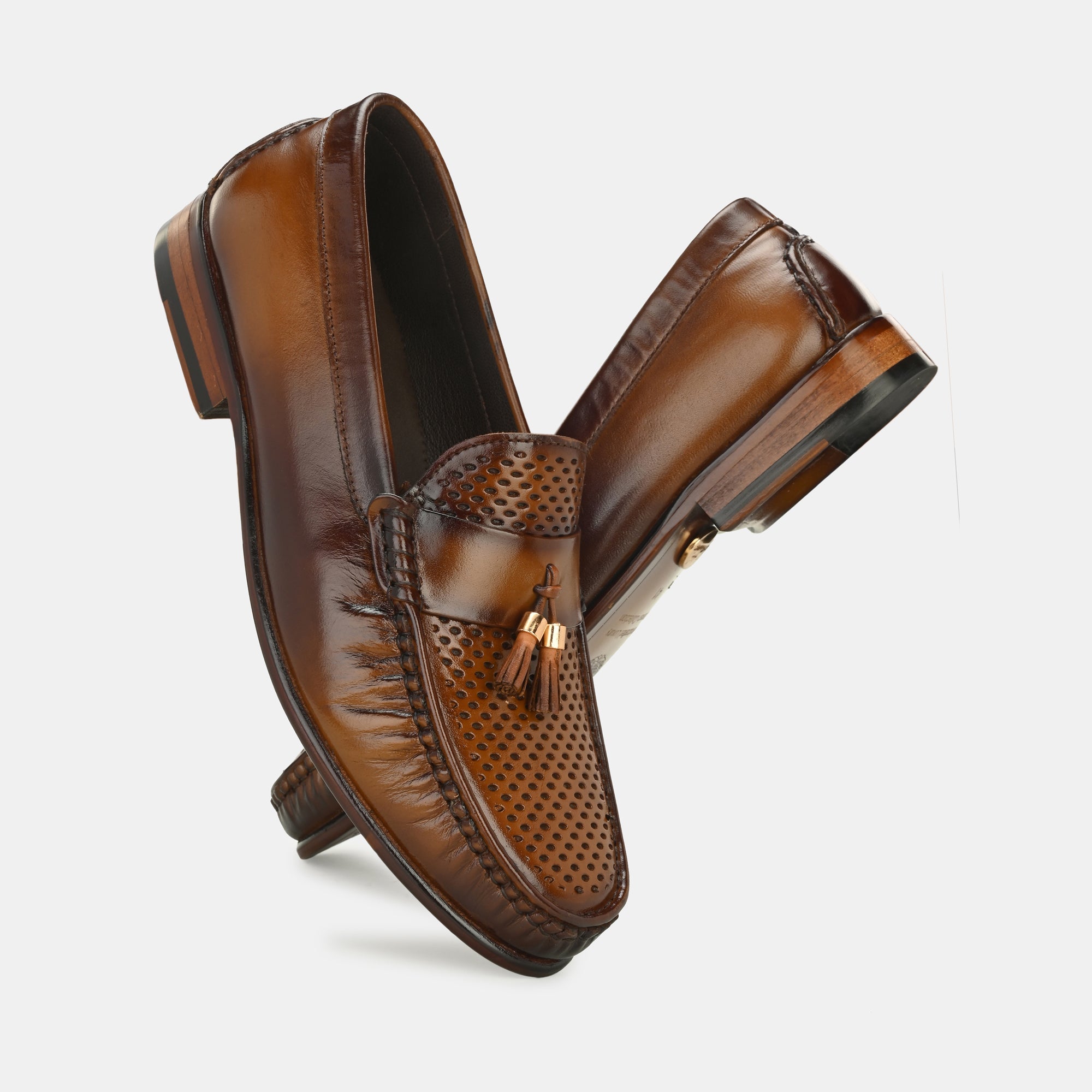 Tan Perforated Tassel Loafers by Lafattio